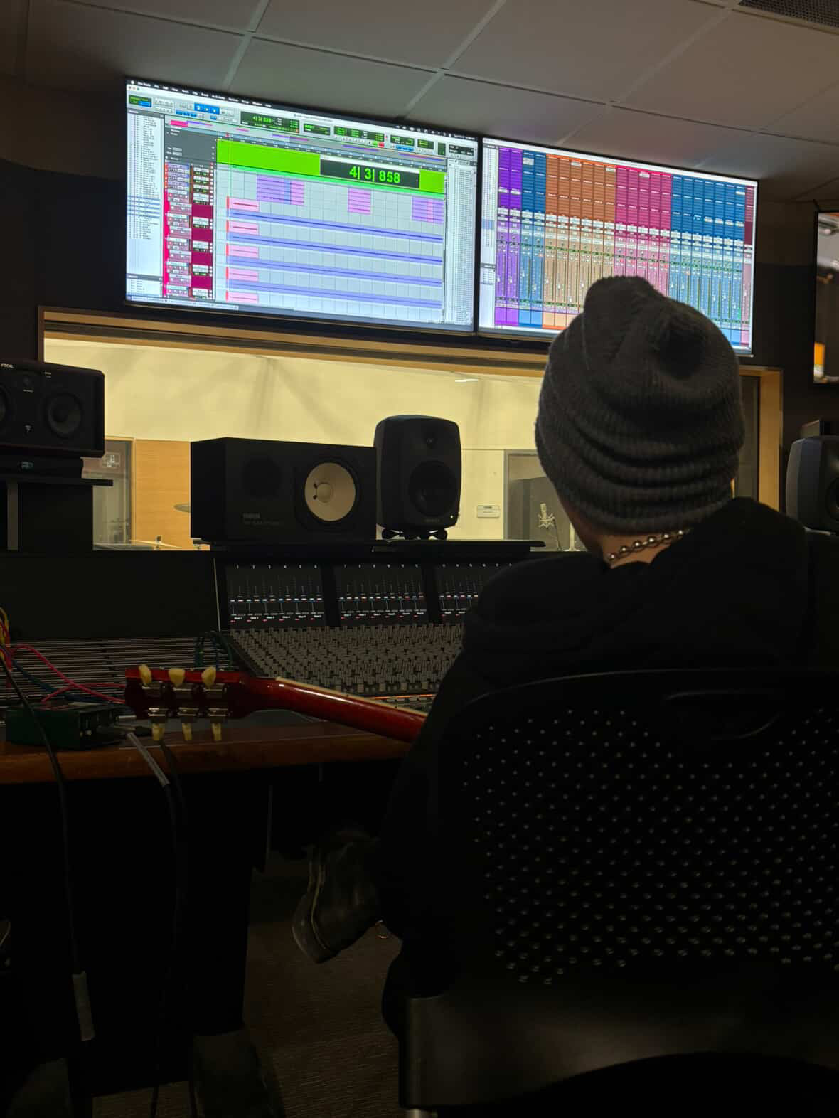 Short guy playing bass